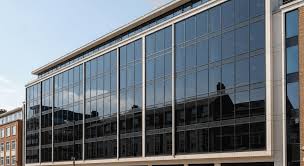 Reflective window film on a multi-storey office building